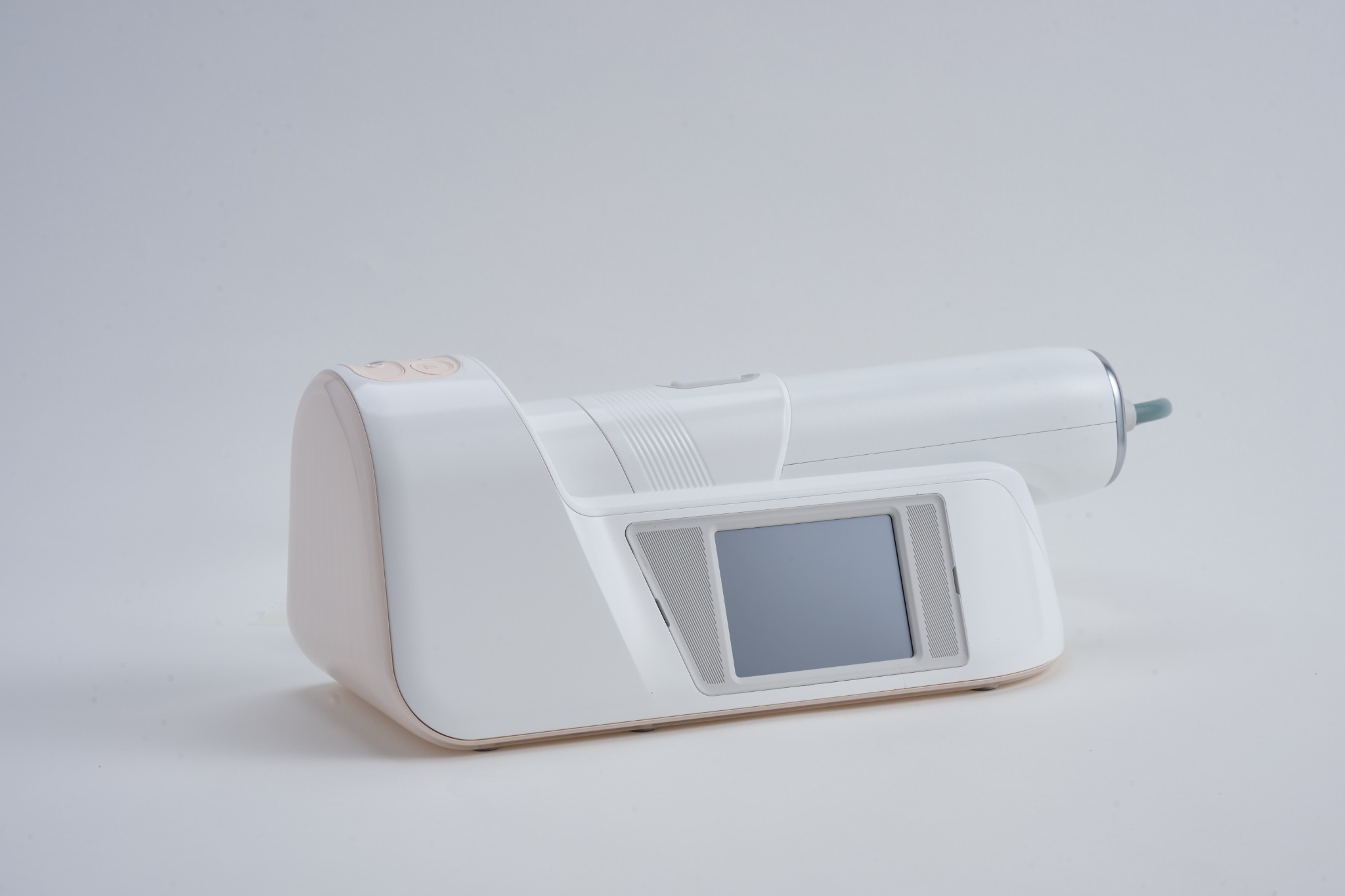AET-Shot handpiece resting horizontally in the recessed station dock